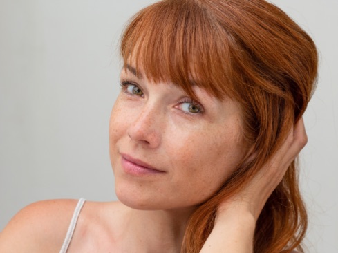 Portrait of woman with sun spots