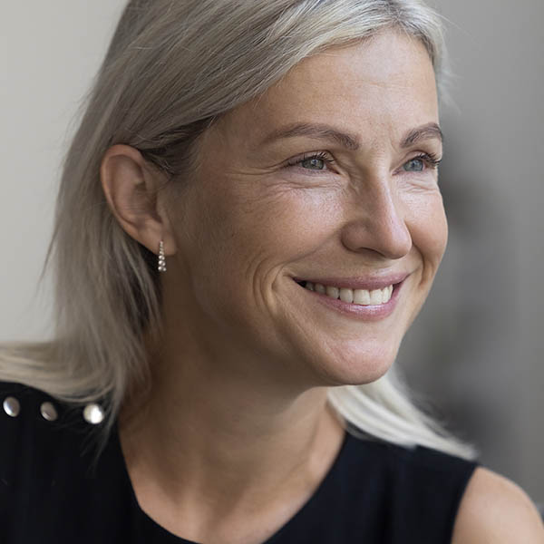 Smiling middle-aged grey-haired woman